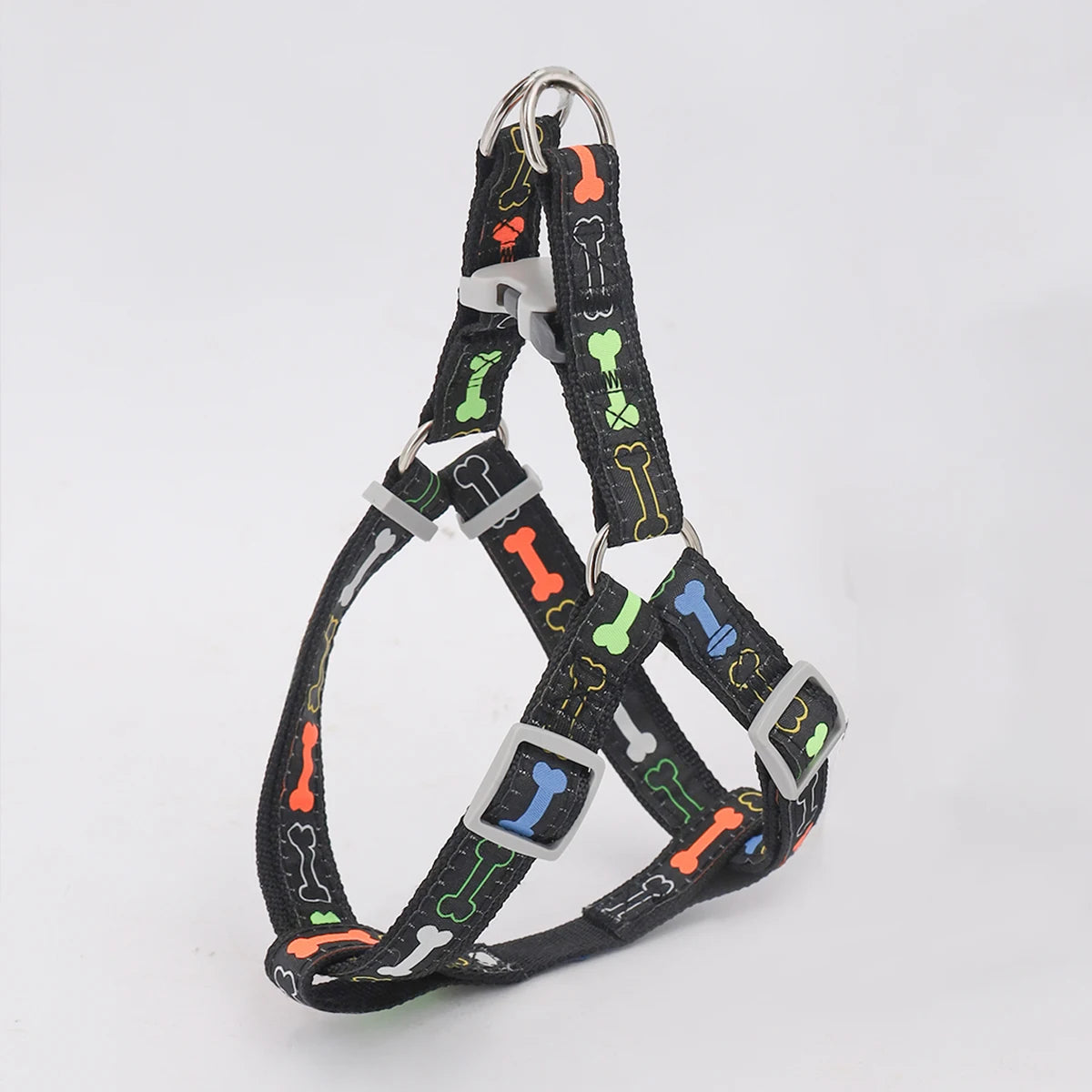Arnés colorido con diseño de hueso para perros, cómodo y ajustable para paseos