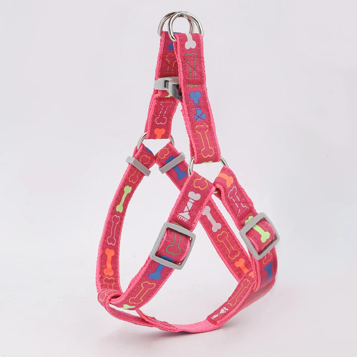 Arnés colorido con diseño de hueso para perros, cómodo y ajustable para paseos